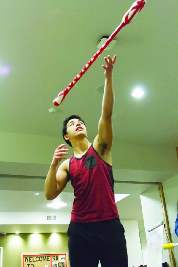 Josh Erme practices a siva afi stick as part of the Pacific Islanders club (PICCA) on campus, founded by Pierce Salavea.

Ben Hansen | The Falcon