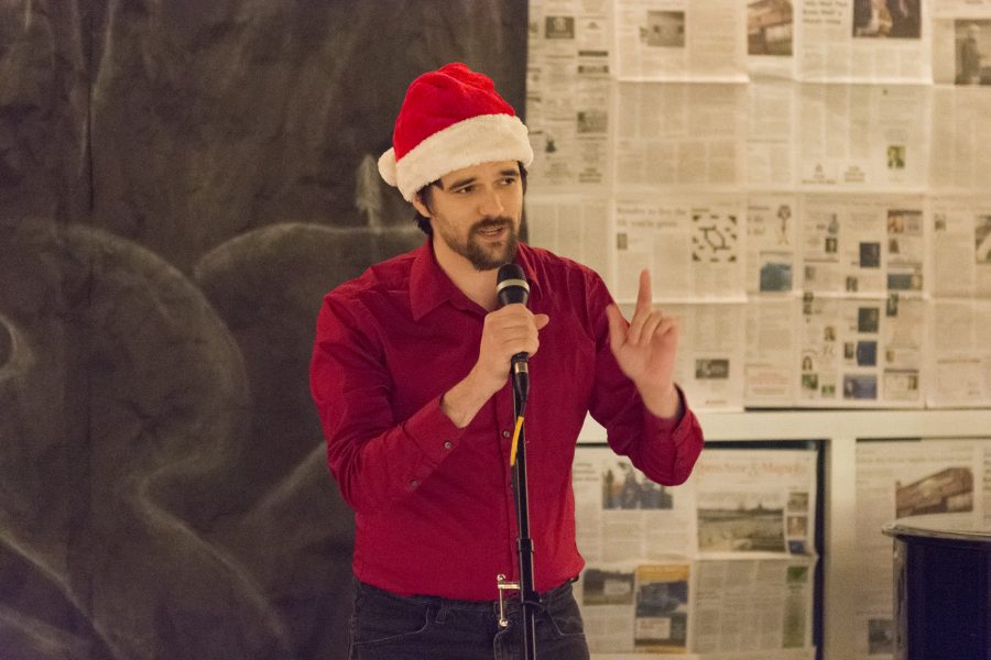 Kyle Sogge performs a Christmas song for the Emerson Coffee House, performing in his Santa hat on February 18.

Photo Courtesy of Quinton Cline | Cascade