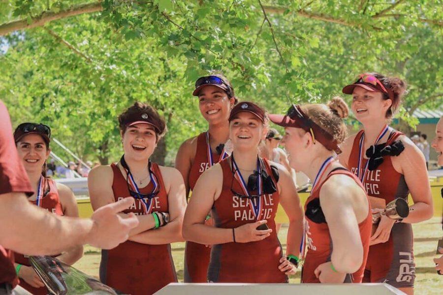 The rowing team celebrates after finishing a race.

Photo Courtesy of Keely Long