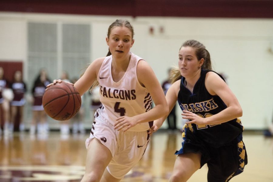 Riley Evans brings the ball down the opposing teams side of the court.

Alison Meharg | The Falcon