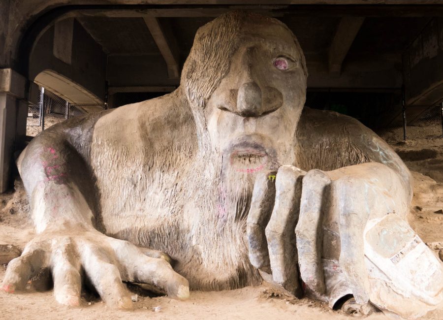 The Fremont Troll sculpted by Steve Badaness, Will Martin, Donna Walter, and Ross Whitehead in 1990 under the Aurora Bridge, was inspired by Scandinavian folklore.