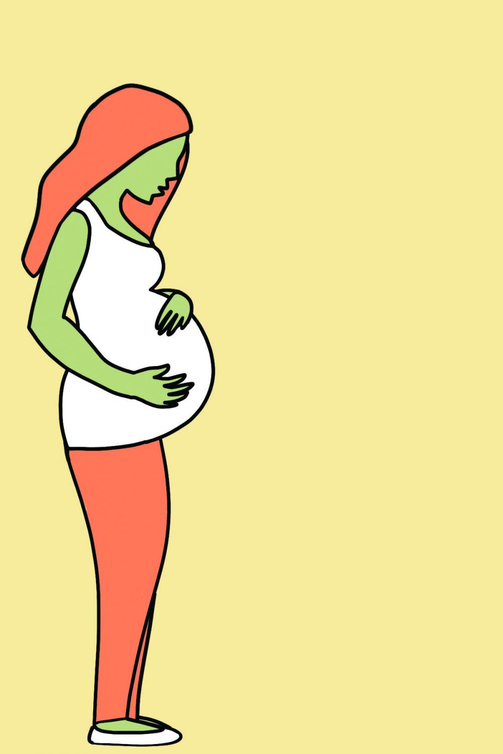 A pregnant woman holding her belly