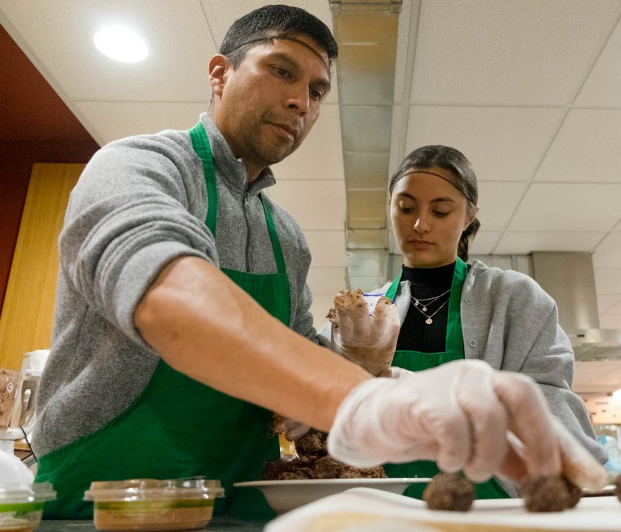 Eldon and Reya Moore prepare fig and ginger truffles at the SPU Community Kitchen on Wednesday, Nov. 20.