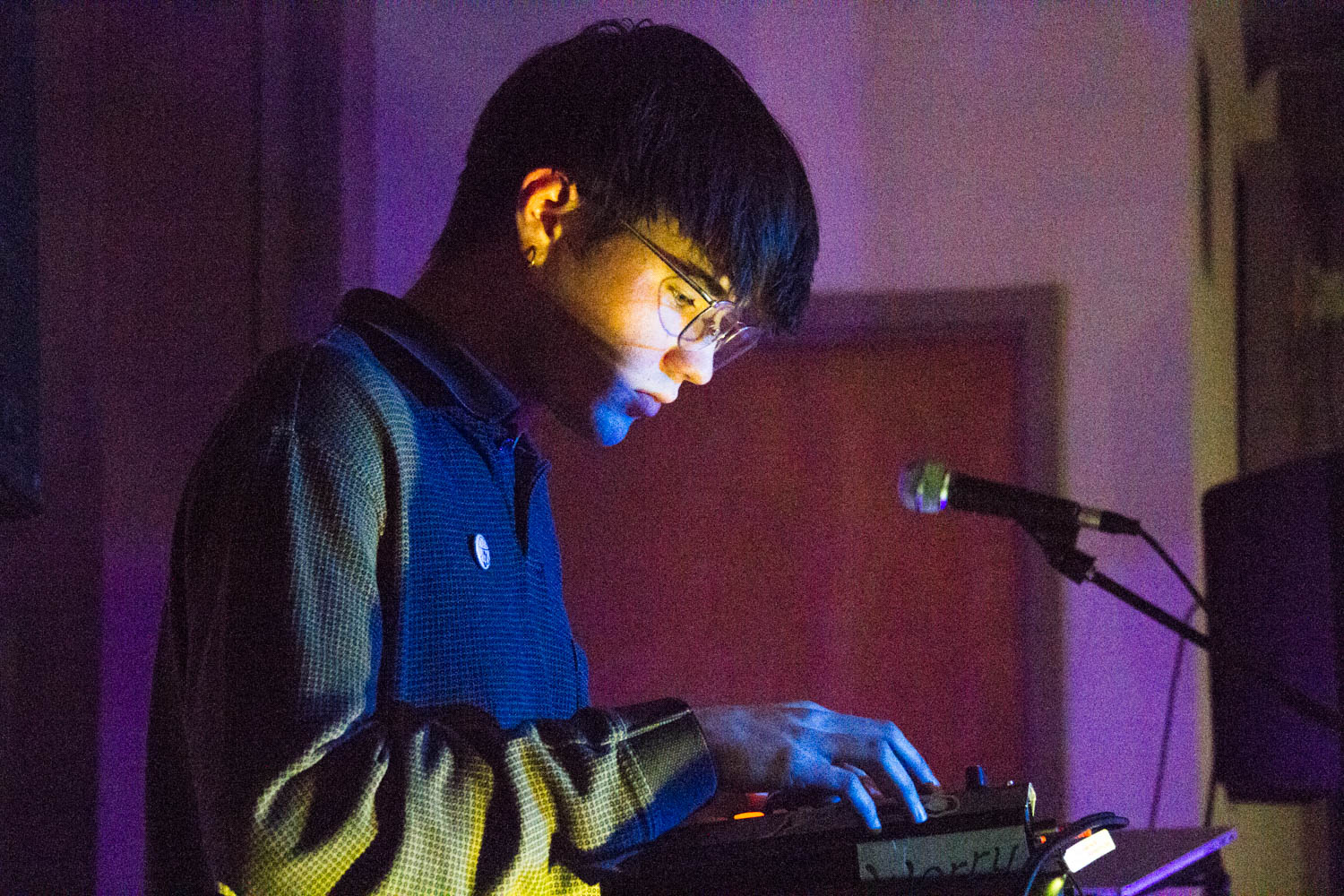 Owen Sweeney plays on an electronic instrument.