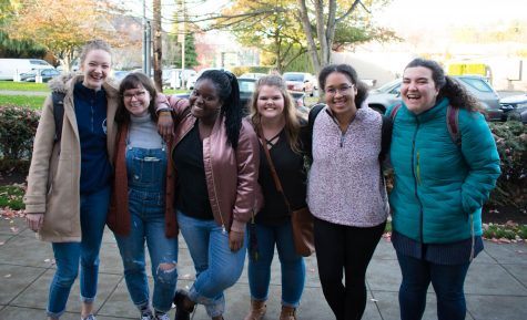 A group of six women posing for a photo