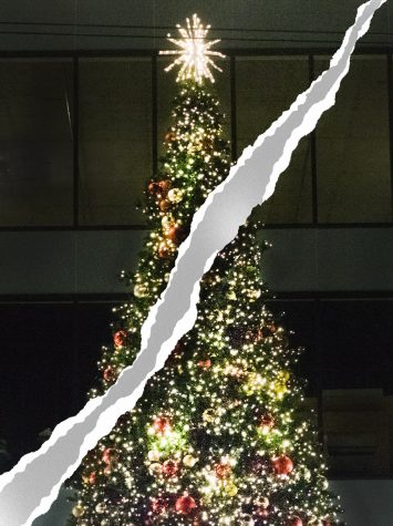 A lit-up Christmas tree with a tear through it