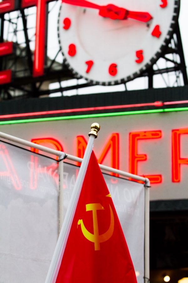 a soviet flag in front of a sign