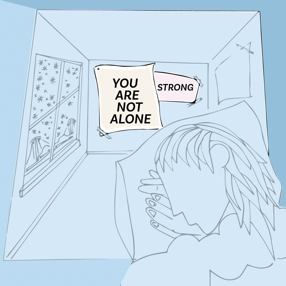an illustration of a person sleeping with posters that read "you are not alone" and "strong on the wall behind