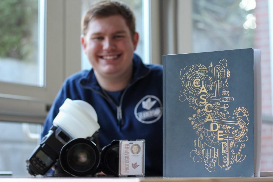 Senior Cascade Photographer Quinton Cline, shares his pride in his work by showing his photographs in the Cascade Yearbook.