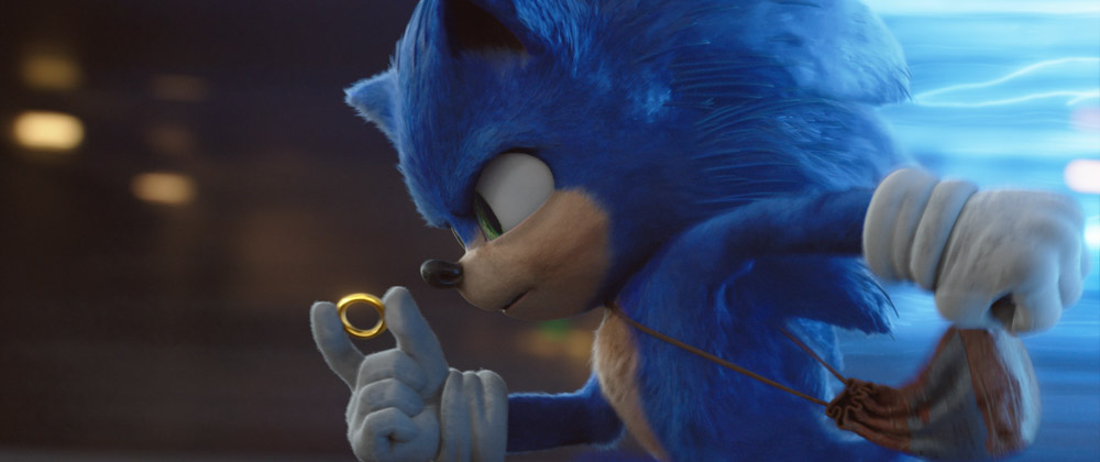 sonic the hedgehog runs with a ring