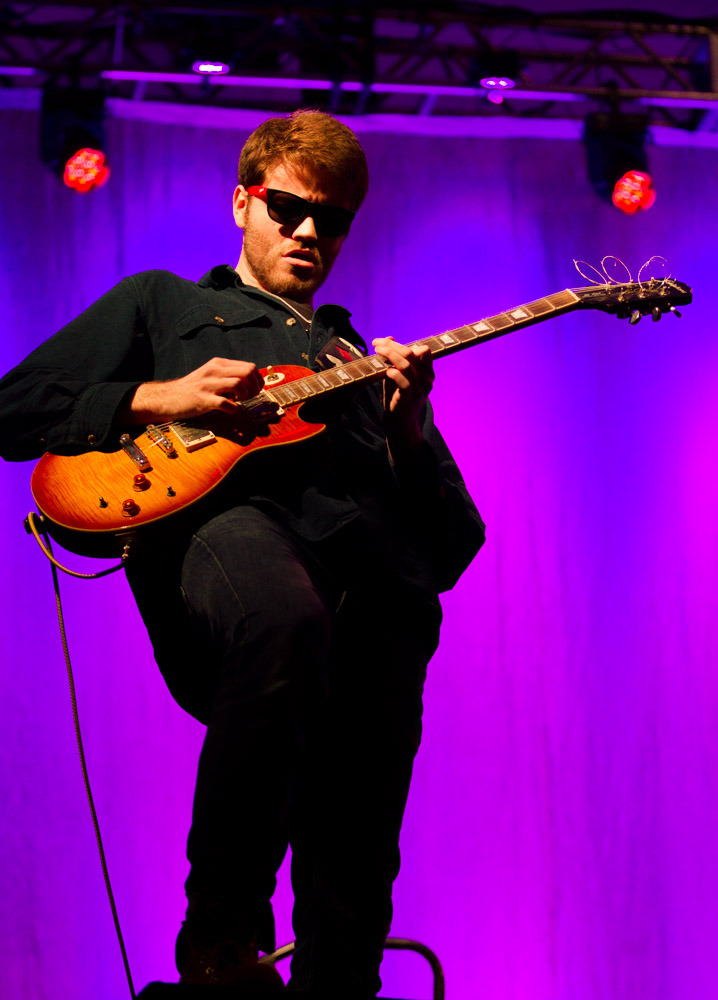 a man plays a guitar