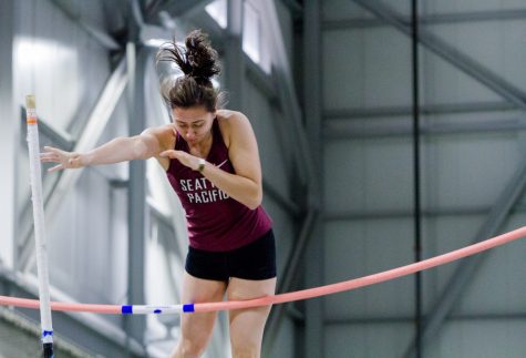 a woman hits the bar during a pole vault attempt