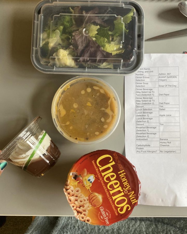 Bea Boumans breakfast and lunch, next to her selection menu, delivered to her during quarantine.