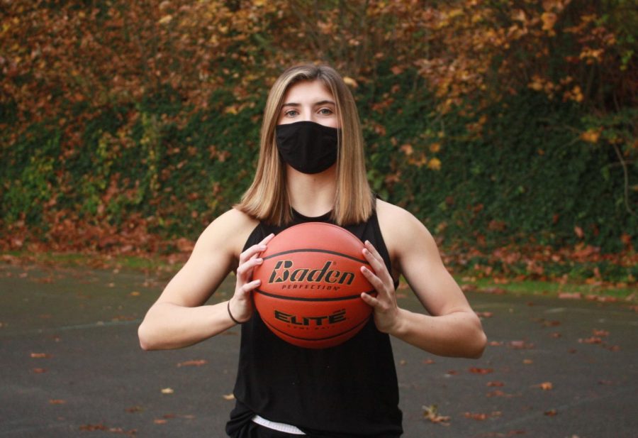 SPU Womans Basketball player Hailey Marlow gets ready to practice at Ashton Court.