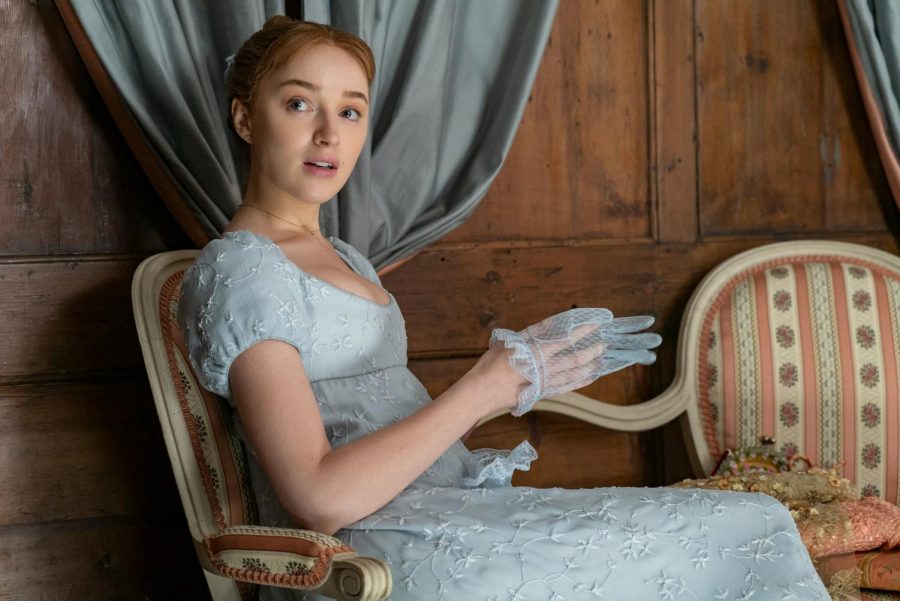 Phoebe Dynevor as Daphne Bridgerton, a young lady navigating her debut in society, required to seek out a suitor.