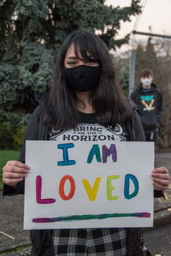 Rylee Rodriguez, a first year student, expresses a message of care at the demonstration on Friday.
