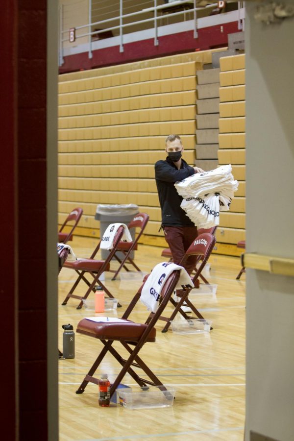 Chairs are set apart for athletes when they are not on the court.