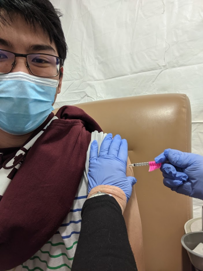 Junior Jacob Wong received the Pfizer vaccine at Seattle Cancer Care Alliance.