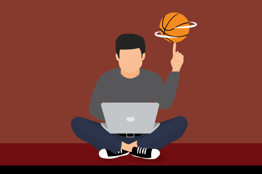 A guy sits crisscross with a laptop while spinning a basketball on his finger