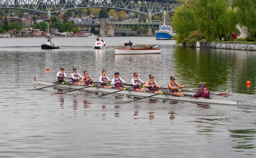 Womens Rowing crosses the finish line on Saturday morning.