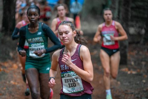 Annika Esvelt runs through the one kilometer marker in the lead pack at the GNAC championship meet. (Rio Giancarlo)