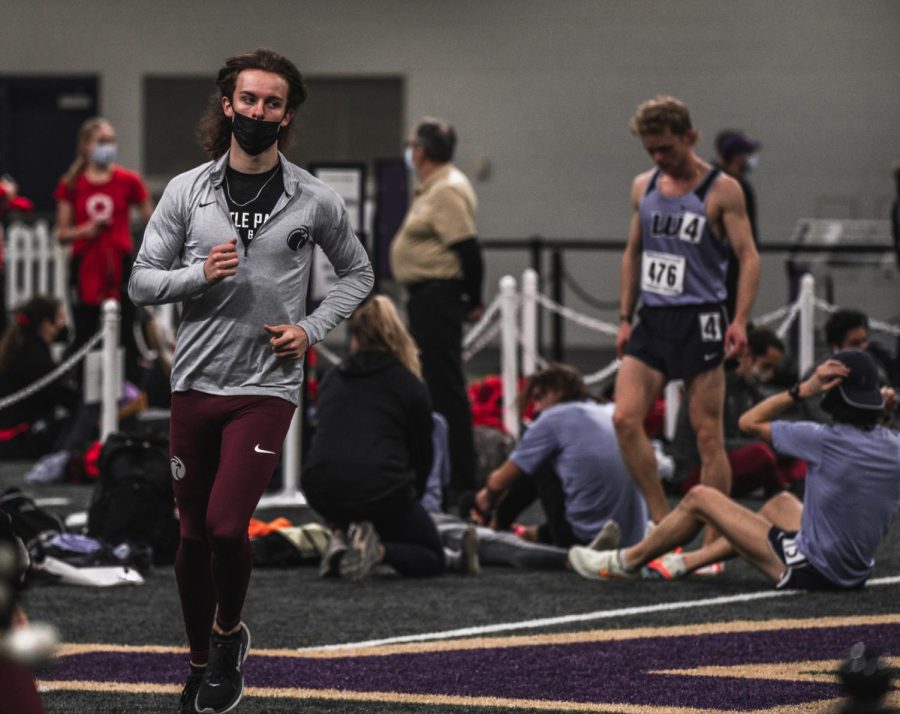 Sophomore sprints runner Evan Carpenter warms up for the 400 at the University of Washington indoor preview. (Rio Giancarlo)