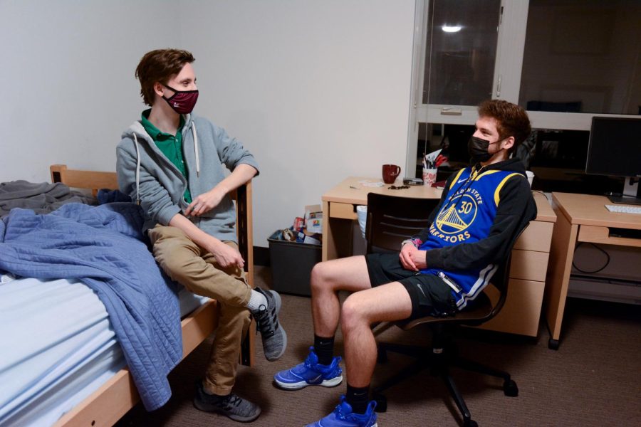 Students Trayton Pike and Issac Johnson hanging out in Arnett while abiding by the schools COVID mask policy. (Devin Murray)