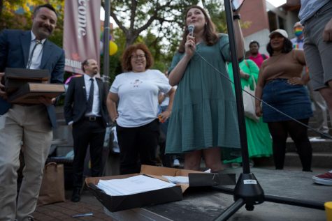 Copies of the lawsuit were placed on the small stage set up for the September 12 demonstration in Martin Square at Seattle Pacific University in Seattle, Wash.