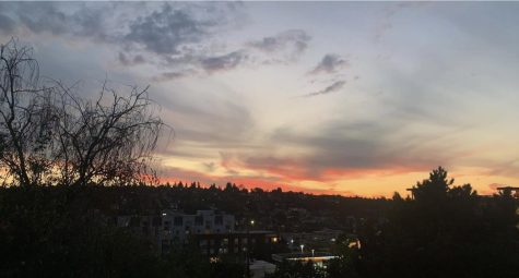 Wildfire smoke drifting in from outside Seattle gives the sunset over Interbay extra color.