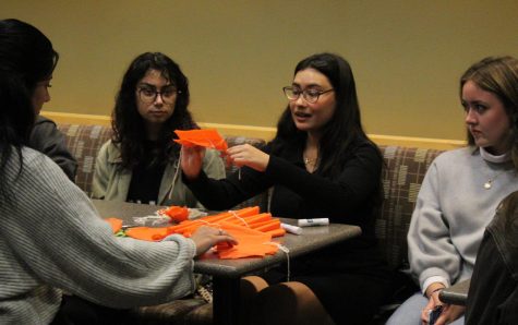 MEChA members making paper flowers to imitate  marigolds, a key flower in the tradition of Day of the Dead. MEChA meets on Thursdays and is one of SPUs many multicultural clubs on campus.