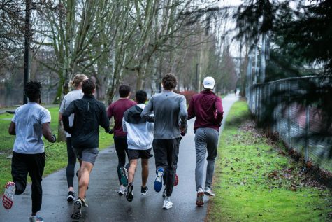 Members of the SPU cross country team run on the Ship Canal trail near Wallace Field during a practice on Jan. 10, 2021. 