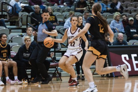 Fifth year guard Ashley Alter advances the ball during SPUs game against Pacific Lutheran at Royal Brougham Pavilion on Nov. 5, 2022.