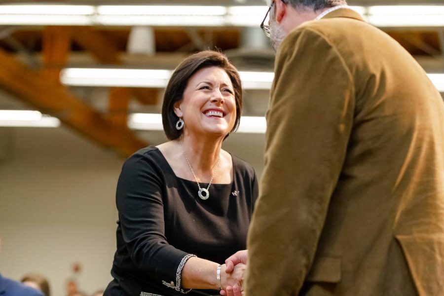Dr. Deana Porterfield shakes hands with a faculty member after her introduction at Seattle Pacific University in Seattle, Wash. on Jan. 26, 2023. Dr. Deana Porterfield was appointed to the position by unanimous vote and will begin work at Seattle Pacific on July 1st, 2023. 