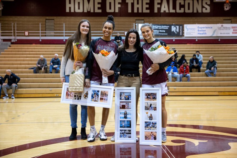 From left to right Makenna Jacklin, Natalie Hoff, Chiara De Virgilio and Ashley Alter pose for a photo on senior night at Royal Brougham Pavilion on Feb. 25, 2023, in Seattle, Wash.