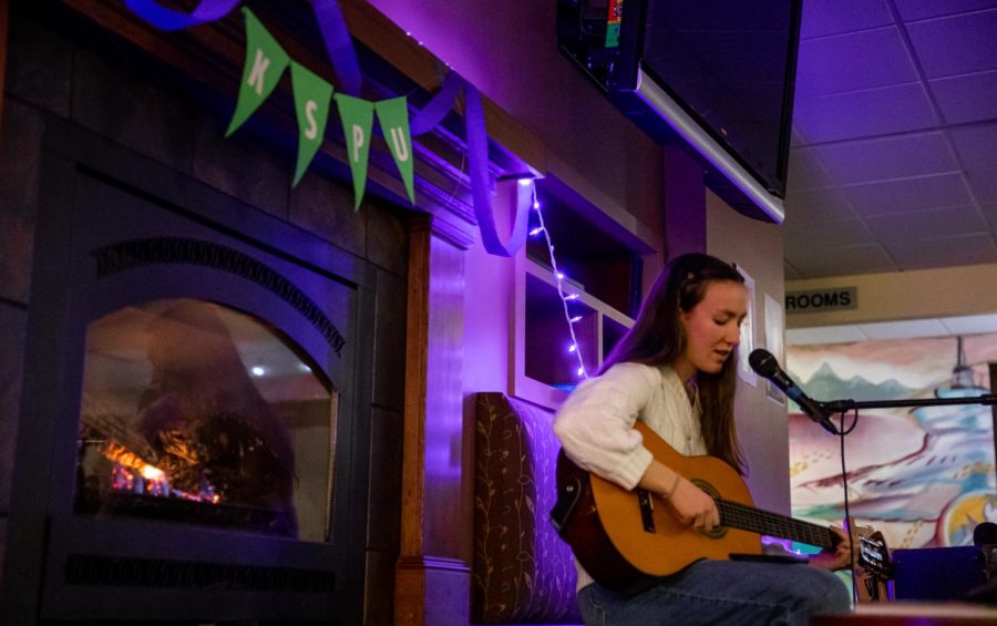 Sophomore nursing student Carolyn Filley preforms during the KSPU open mic night held in Water Hall at Seattle Pacific University in Seattle, Wash., on Thursday, Feb. 9, 2023