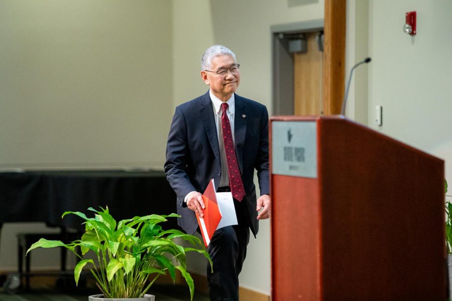 Board of Trustees Chair Dean Kato walks to the podium before introducing University president-elect Deana Porterfield at her announcement ceremony at Seattle Pacific University in Seattle, Wash. on Jan. 26, 2023.