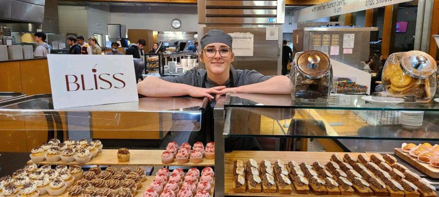 Ryely Eick, new pastry chef at Gwinn Commons, shows off that nights dessert station. 