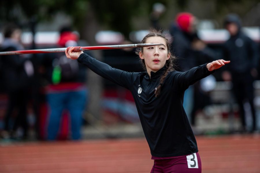Freshman multi event specialist Hannah Chang throws the javelin, an outdoor only event, during the Ed Boitano Invitational at the University of Puget Sound in Tacoma, Washington.