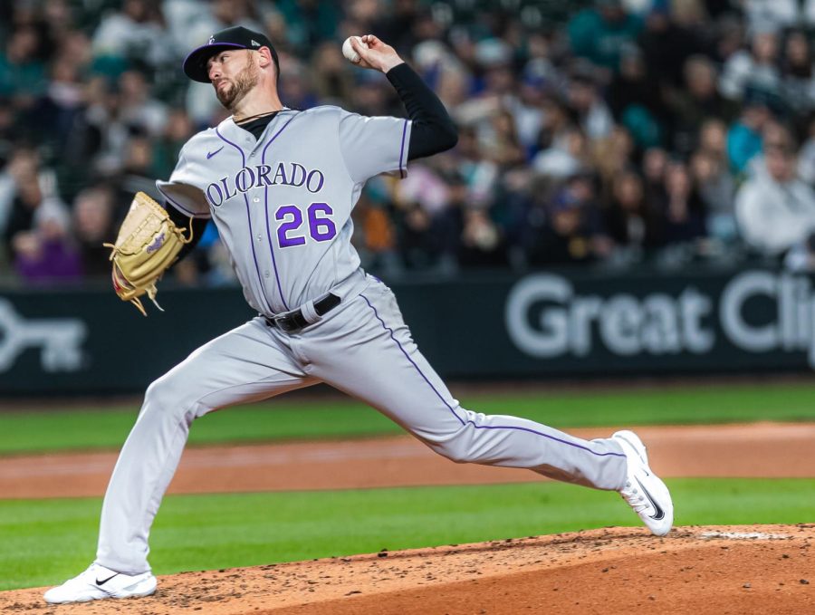 Colorado Rockies starting pitcher Austin Gomber (26) throws a pitch during the fourth inning of a baseball game Friday, April 14, 2023, in Seattle. The Mariners won 5-3.