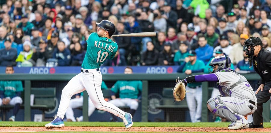 Seattle Mariners left fielder Jarred Kelenic (10) hits a 2 run home run to center during the second inning of a baseball game Friday, April 14, 2023, in Seattle. The Mariners won 5-3.
