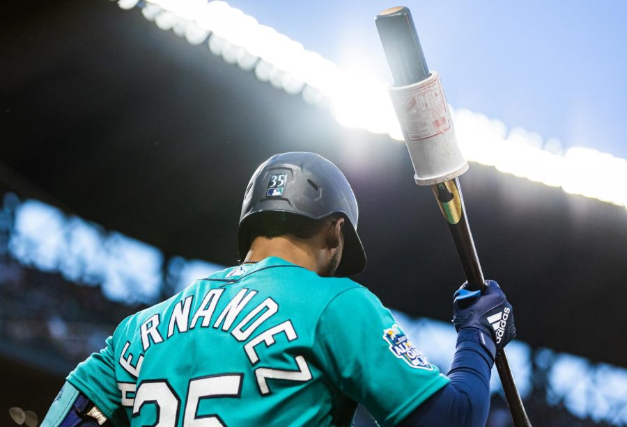 Seattle Mariners right fielder Teoscar Hernandez (35) steps into the on deck circle ahead of his at bet during the third inning of a baseball game Friday, April 14, 2023, in Seattle. The Mariners won 5-3.