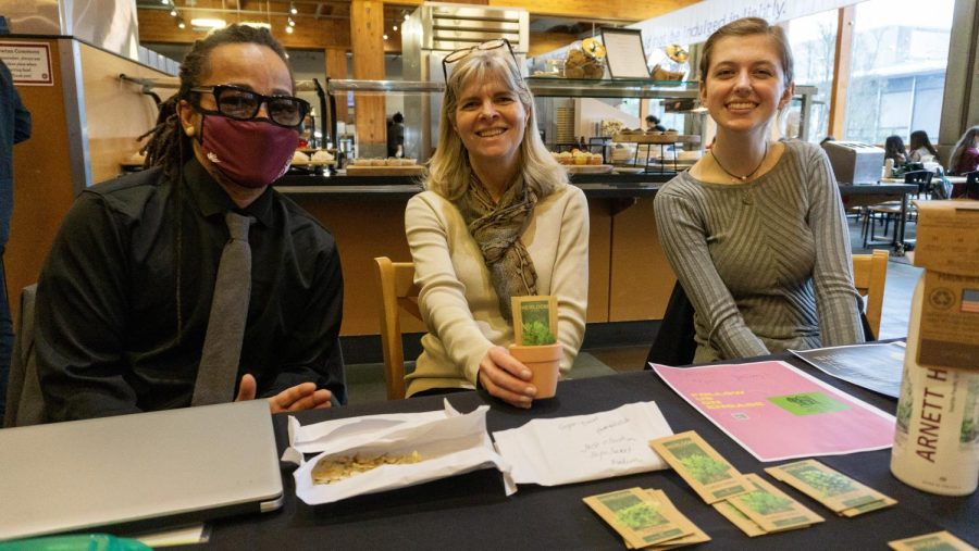 Three members of SPUs Sustainability Club at the vegetarian dinner in Gwinn on Friday, April 21st, 2023.