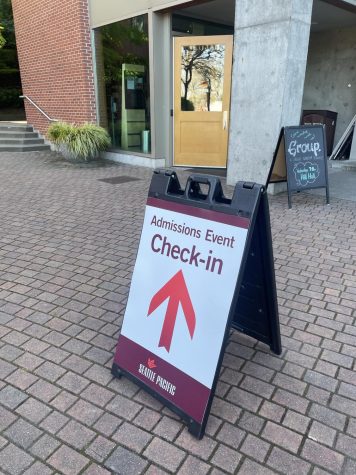 Admissions Event Check- in sign placed outside of Gwinn Commons during an admissions event on campus. 