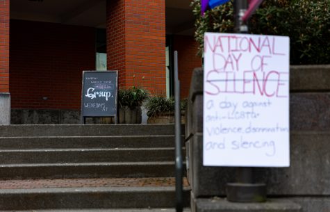 Signs for Group, a worship program put on by university ministries, and the National Day of Silence, 