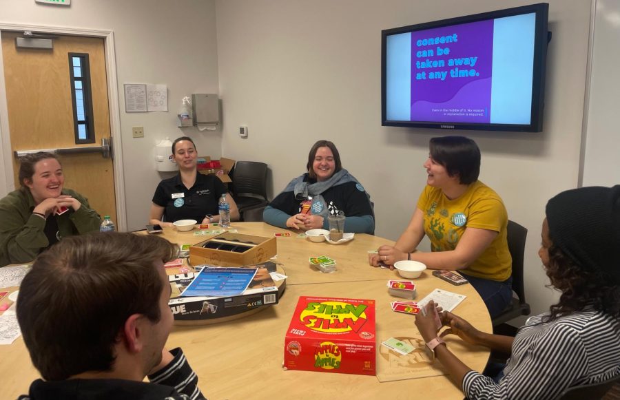 Students gather in Cremona room 102 to play games, have snacks and discuss what consent means on Wednesday, April 26, 2023. 