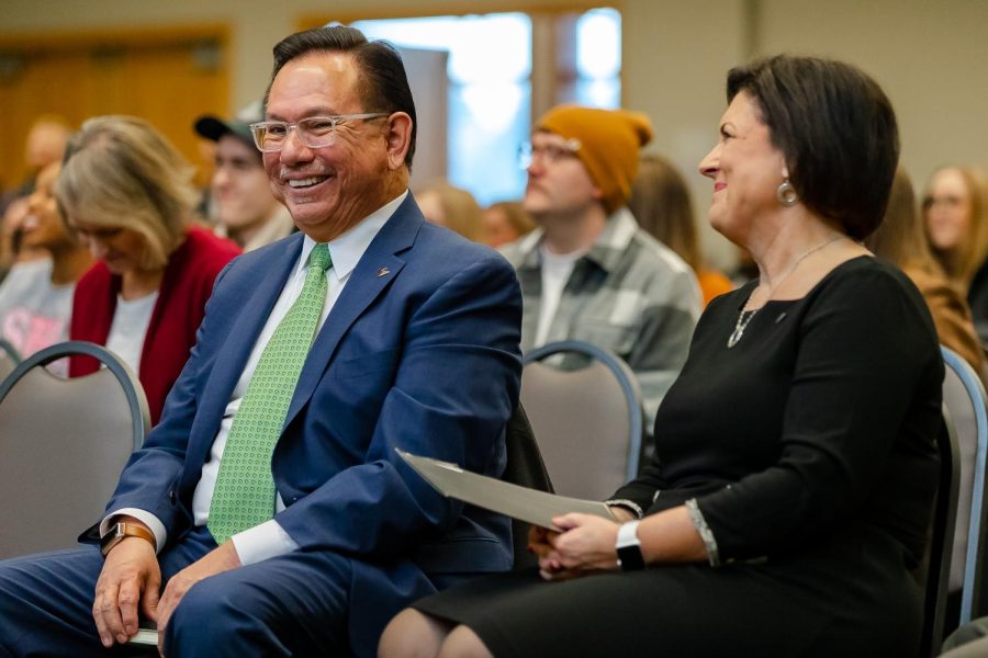 Interim President Pete Menjares shares a laugh with UniversityPresident-elect Deana Porterfield at   her announcement ceremony on Monday, Jan. 26, 2023.