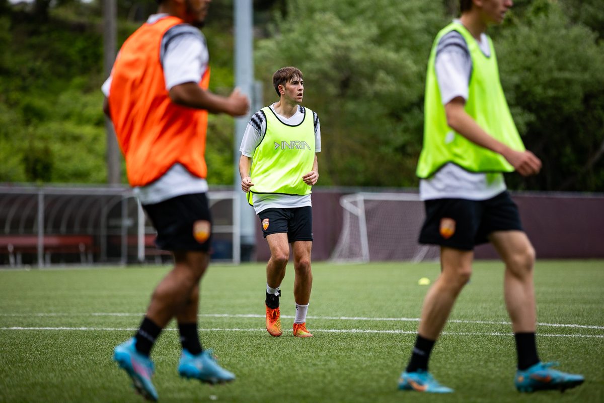 Cameron Yriondo (center) waits for a pass during a training session at Interbay Stadium in Seattle, Wash., on Tuesday, May 9, 2023. Starting with the reserves, Yriondo was able to work his way into the main squad scoring a goal against Olytown and playing a key role during the title run.