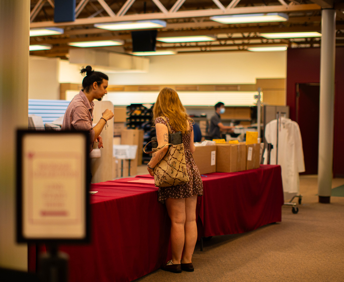 A student gets help at the SPU Bookstore in Seattle, Wash., on Wednesday, Sept. 9, 2023. The bookstore is undergoing changes, shifting towards operating mostly online