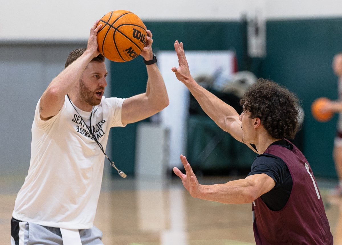 Mens basketball assistant coach Donald Rollman is defended by Owen Moriarty during practice on Tuesday, Sept. 12, 2023 in Seattle. Rollman joined the falcons as the lead assistant after four years as head coach at Peninsula College.