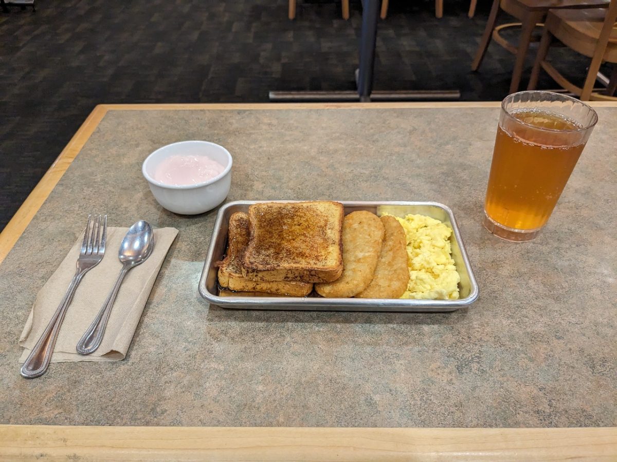 Standard weekday breakfast at Gwinn Dining Hall. Featured food includes, yogurt, apple juice, french toast, hasbrowns, and scrambled eggs. 